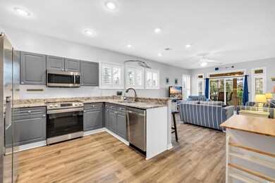 Kitchen with light hardwood / wood-style flooring,