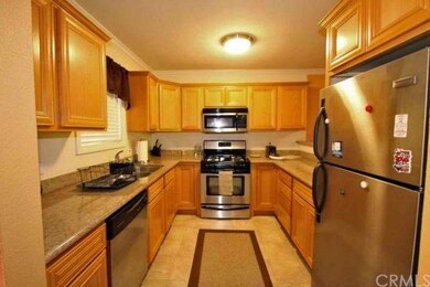 Upgraded kitchen with beautiful granite counters a