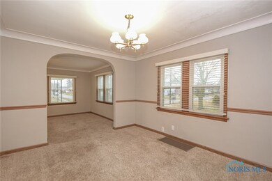 A formal dining room is located just off the kitch