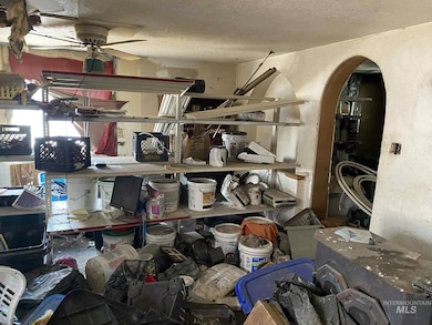 Storage area featuring a ceiling fan