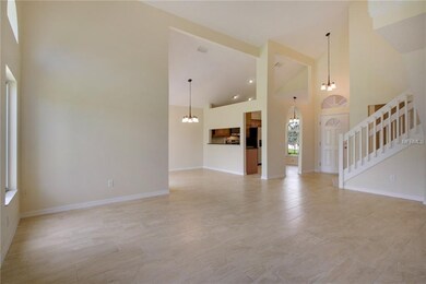 Family room viewing to dining room and front entry
