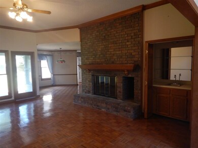 Masonry Fireplace and Wet Bar on Right