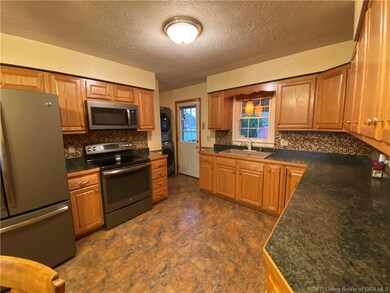 Updated kitchen with lots of cabinet and counter t