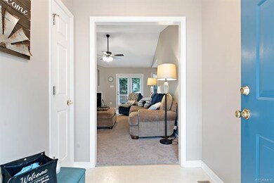 Entry with a coat closet.