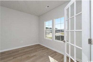 Spare room with light hardwood / wood-style floori