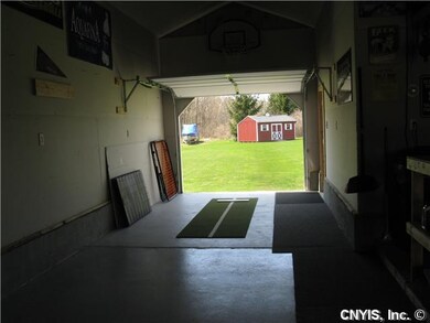 Other. The detached garage offers front and back o