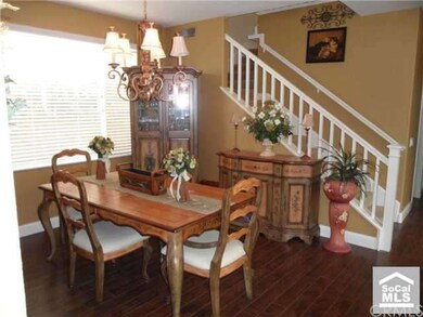 Formal dining room as well as eating area in kitch