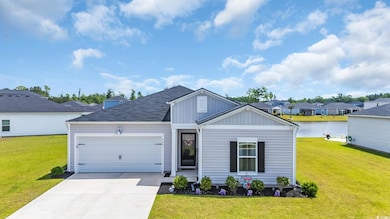 Front Elevation with view of the lake in the background.