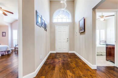 Tall ceilings in the entry hall...primary suite is