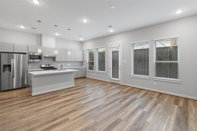 Open concept kitchen/living room design.