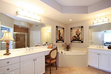 Master bath with dual sinks, separate tub & shower