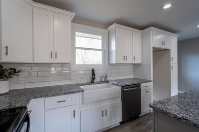 Another view of the kitchen. Large farm sink area overlooks the backyard. 