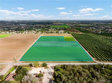 Birds eye view of property featuring a rural view