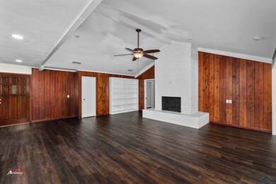 Unfurnished living room with lofted ceiling, ceili