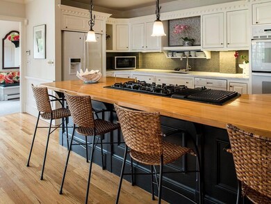 view of the kitchen island with a...