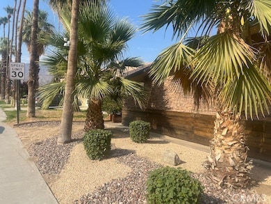 51099 Eisenhower Dr unit 4, La Quinta, CA 92253 - photo 2