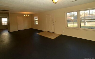 Living Room with closets and freshly painted floor