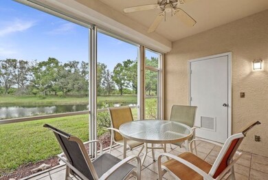 Sunroom featuring ceiling fan and a water view