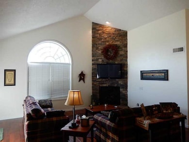 Living Room. Vaulted ceilings, stone fireplace, ha