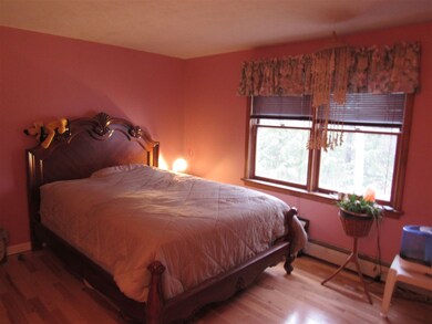 Hardwood floors continue into bedrooms,  master ha