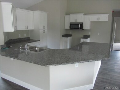 Kitchen w/granite counter tops
