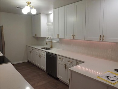 Kitchen featuring dark hardwood / wood-style floor