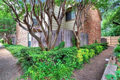 View of Front entry through gated patio