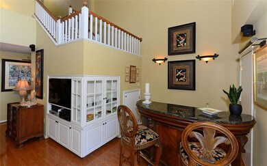Oak staircase, built-ins and bar.