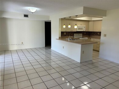 8933 SW 123 Ct unit 105, Unincorporated Dade County, FL 33186 - photo 3
