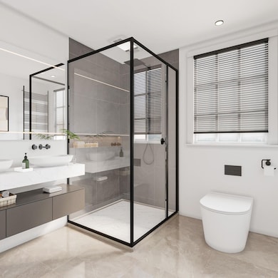 Bathroom with vanity, a shower stall, and marble 