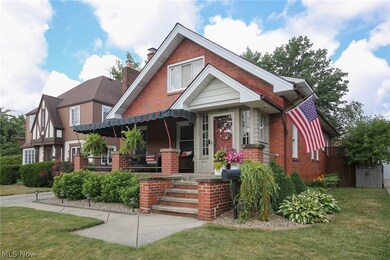 View of front of house with a front yard