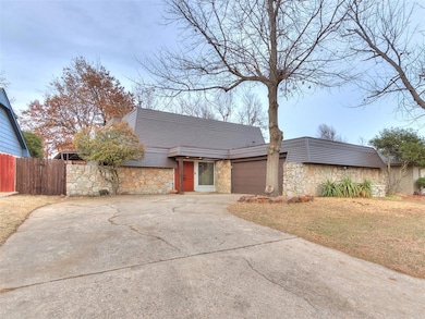 View of front of property featuring stone siding, 