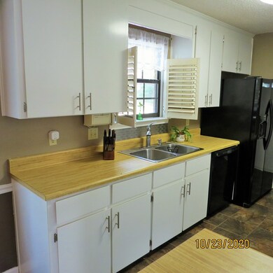 New flooring and Nice Clean Cabinets