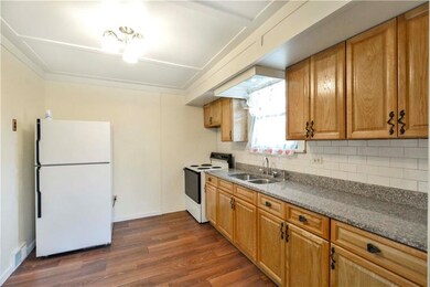 The kitchen was updated this year! New oak cabinet