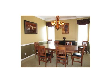 Dining Room With Beautiful Chandelier