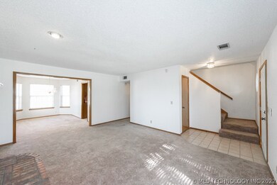 Spacious Living Room open to Formal Dining