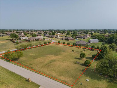 Corner lot with tree line on East side and south s
