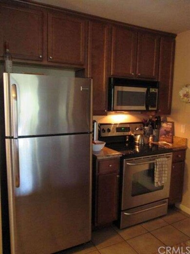 Kitchen with stainless appliances, granite counter