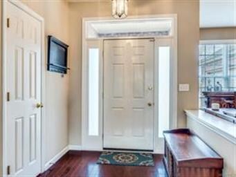 The Foyer features gleaming hardwood floors.