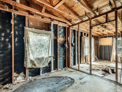 Miscellaneous room with vaulted ceiling