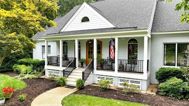 View of front of home featuring covered porch