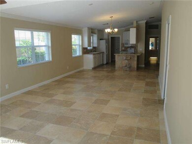 Extended living area for dining and Den.