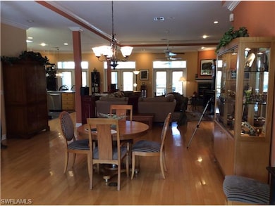 MAIN LEVEL GREAT ROOM WITH LIVING AREA, TRAY CEILI
