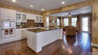 Kitchen with Granite Countertops and Beautiful Har