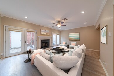 Two glass doors provide access to the backyard. Th