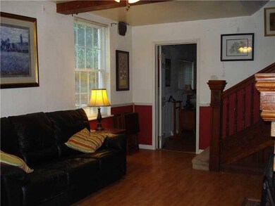 Living Room. Beautiful woodwork, natural lighting 