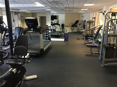 Fitness Room with His/her saunas