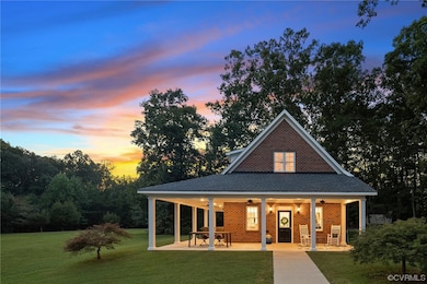 View of front of home featuring a patio area and a