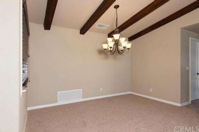 Dining room opens to kitchen and family room.