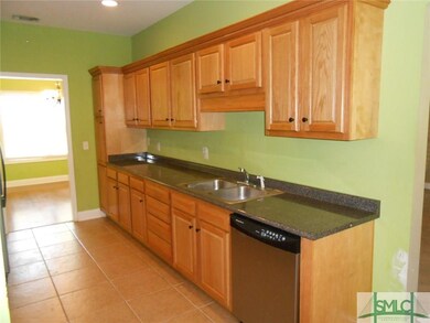 Kitchen with dishwasher, cabinets and great counte